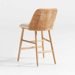 Astrid Upholstered Rattan Counter Stool with Performance Fabric.