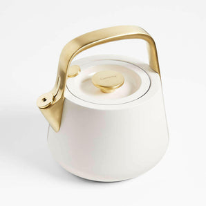 Caraway Home ® Cream Stovetop Whistling Tea Kettle with Gold Hardware.