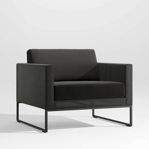 Dune Black Outdoor Lounge Chair with Black Cushions.