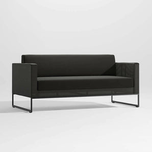 Dune Black Outdoor Sofa with Black Cushions.