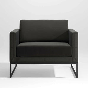 Dune Black Outdoor Lounge Chair with Black Cushions.