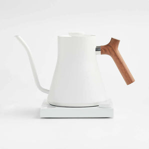 Fellow Stagg EKG Matte White Electric Kettle with Walnut Handle.